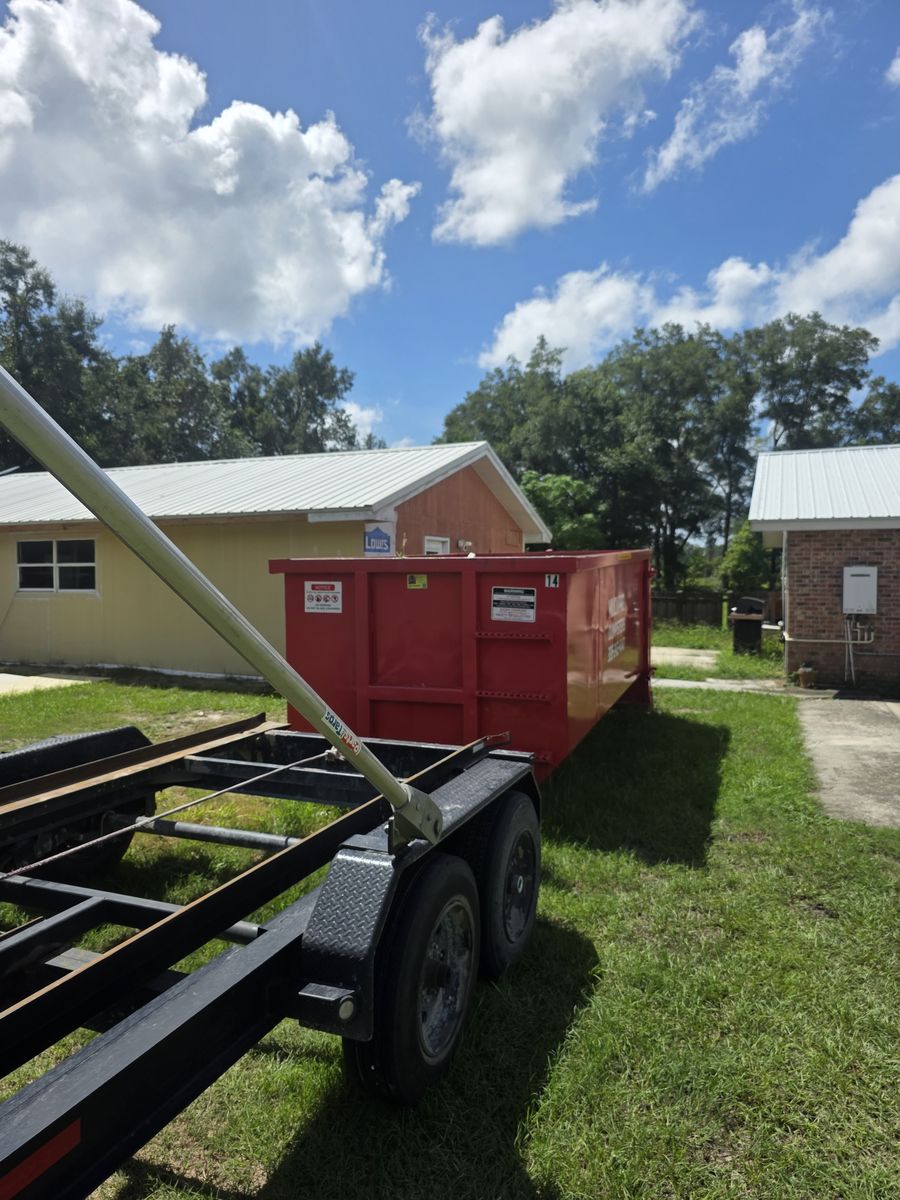 Muckpro roll-off dumpster placed at a Fort White FL property