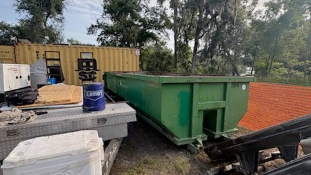 Muckpro dumpster near the Hal W. Adams Bridge on the Suwannee River in Mayo, Florida