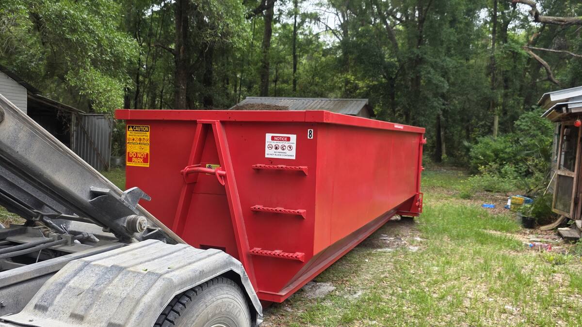 Muckpro roll-off dumpster placed at a property in Old Town, Florida