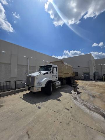 Compactor pad service, doors aligned and reset