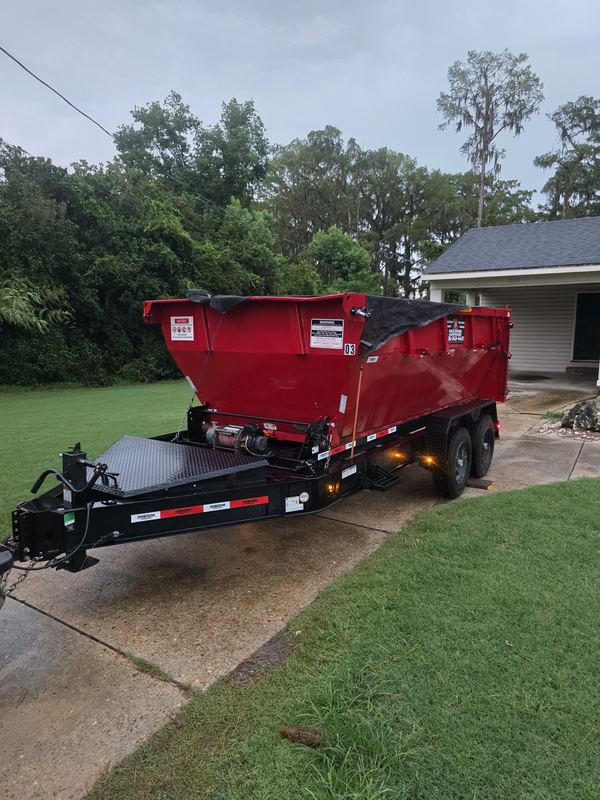 15-yard dumpster delivered on a trailer for a roofing job