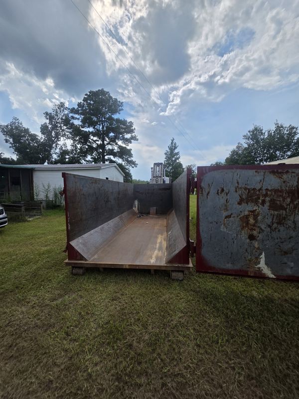 30-yard roll-off dumpster with swing door open for walk-in loading