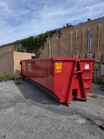 30-yard container on a commercial reroof